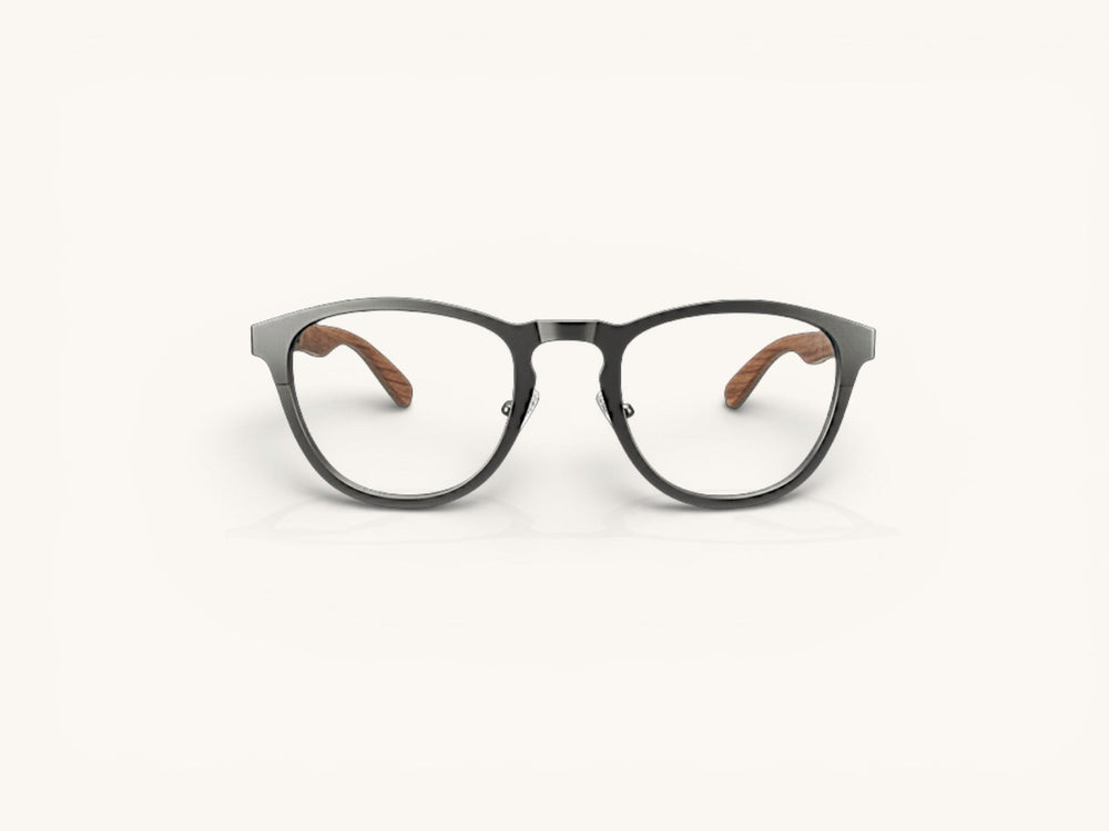 Anteojos Fibra Eyewear Gogo de titanio puro en acabado mate con varillas de madera natural, diseño óptico premium.