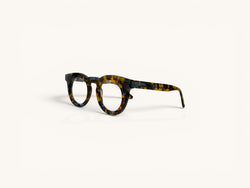 Anteojos ópticos Fibra Eyewear Gogo Premium con marco redondo grueso de acetato en patrón tortoise ámbar y negro